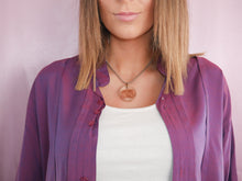 Load image into Gallery viewer, woman wearing vintage coin charm necklace on a silver chain and purple top women&#39;s jewelry
