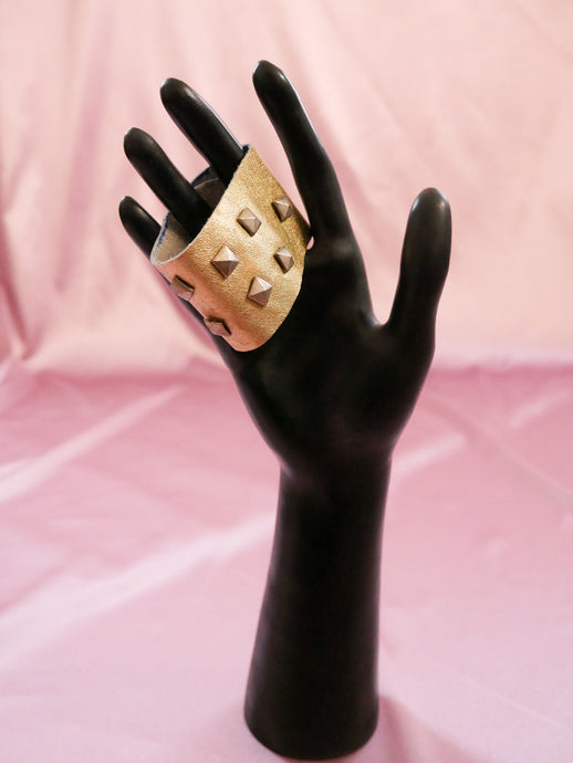 handmade faux gold stud wrap bracelet women's jewelry on black mannequin