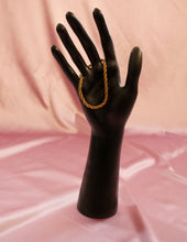 Load image into Gallery viewer, vintage 1980&#39;s gold rope bracelet hanging off of  black mannequin hand
